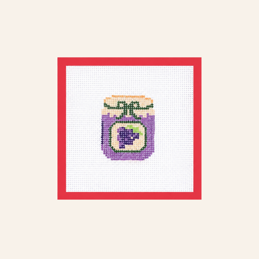 Hand-painted Grape Jam needlepoint canvas on 13-mesh canvas with a red taped border.