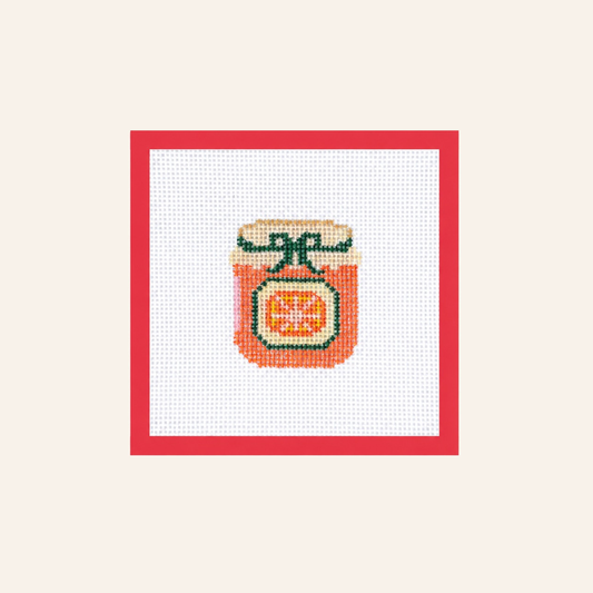 Hand-painted Orange Marmalade needlepoint canvas on 13-mesh canvas with a red taped border.